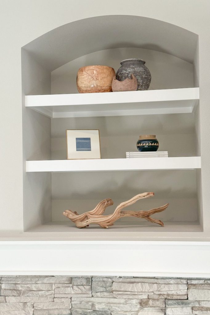 a photo of styling open shelving design
